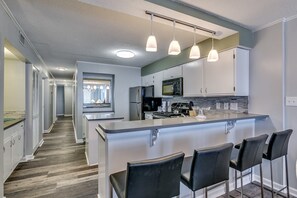 Fridge, microwave, oven, stovetop - Open and Bright Oceanfront Condo, Outdoor Pool | Summit - 7F (North Myrtle Beach)