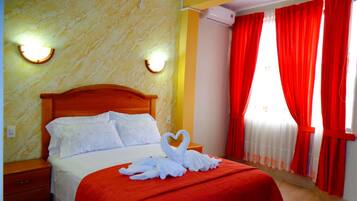 Deluxe Room, 1 Bedroom, City View | Hypo-allergenic bedding, in-room safe, desk, laptop workspace
