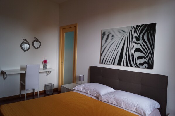Memory-foam beds, desk, free WiFi, bed sheets