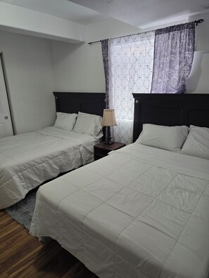 2 dormitorios, tabla de planchar con plancha, wifi gratis y ropa de cama