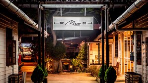 A sign indicating directions to B2 and B1 at the Novo Resort. - MUO Resort (Muar)