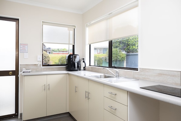 Mini-fridge, microwave, oven, stovetop