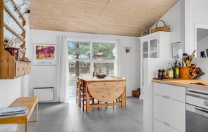 Fridge, stovetop, dishwasher, coffee/tea maker