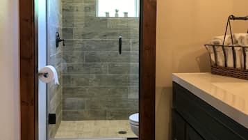 Bathtub, hair dryer, towels, soap