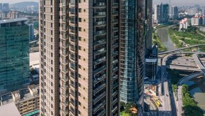 A high-rise building with a sign reading "The Gardens Residences." - St. Giles Mid Valley Kuala Lumpur (Kuala Lumpur)