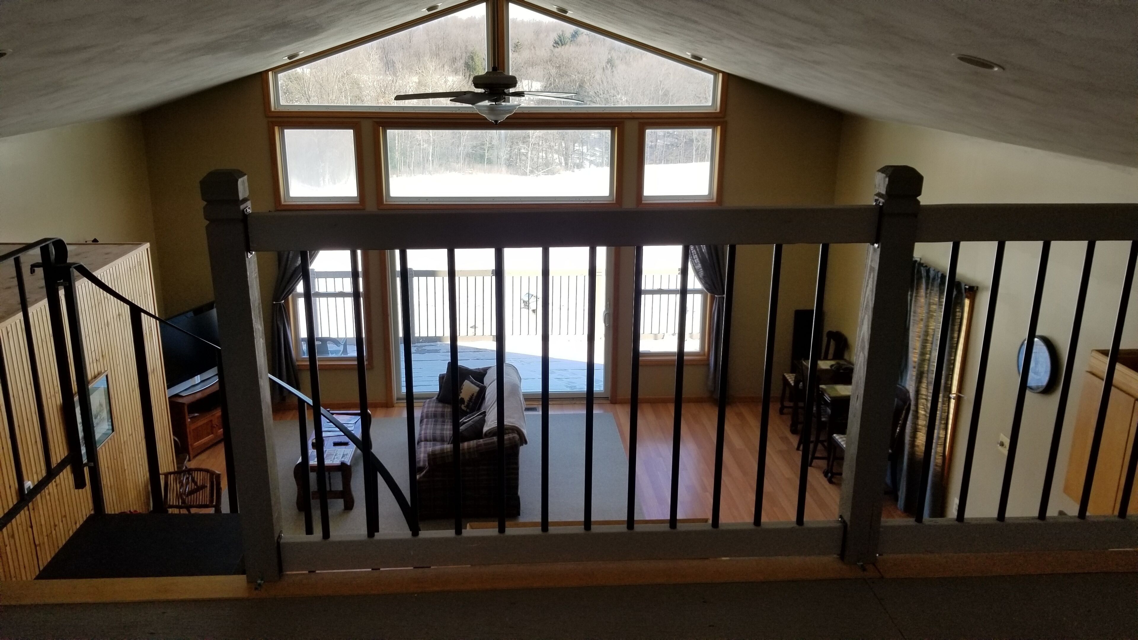 Smart TV, fireplace, books, printers