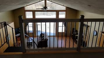 Smart TV, fireplace, books, printers