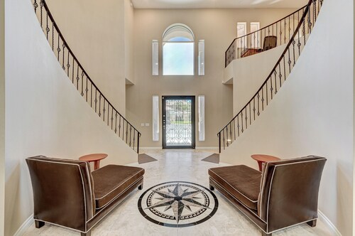 Gorgeous Double Staircase with over 5,100 Sq Ft!  4 miles To The Strip!  Pool!