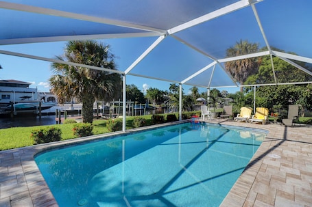 A heated pool. Enjoy a 3-bedroom vacation home in Yacht Club - Special January & February.