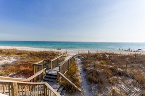On the beach, sun loungers, beach towels