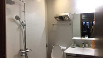 Shower, free toiletries, hair dryer, slippers