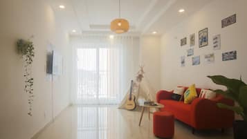 Apartment, 1 Bedroom | Living room | Smart TV