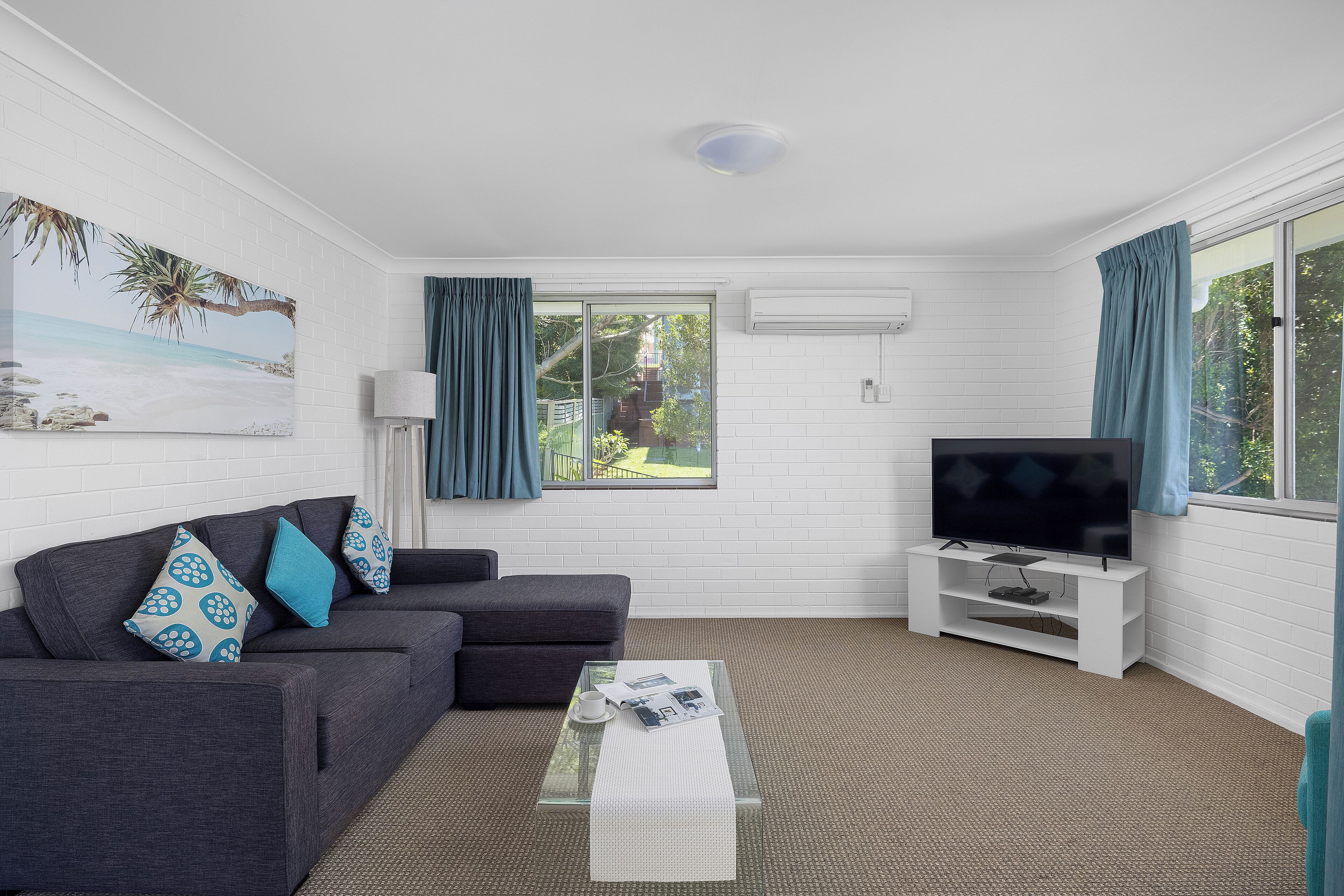 2 Bedroom Unit | Living area | 50-inch Smart TV with digital channels, TV, DVD player