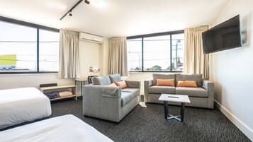 Two Bedroom Apartment | Living area | Flat-screen TV