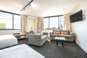 Two Bedroom Apartment | Living area | Flat-screen TV - Nightcap at Chardons Corner Hotel (Annerley)
