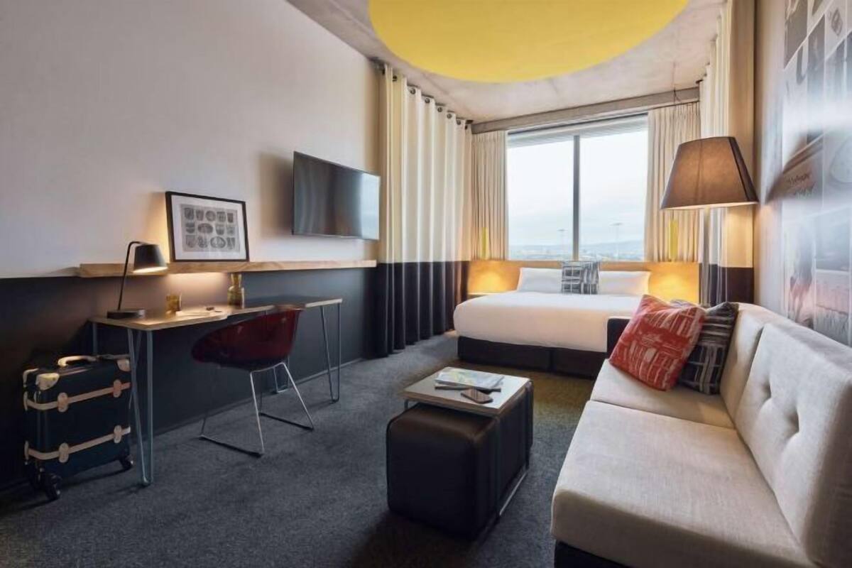 Premium bedding, desk, blackout drapes, soundproofing