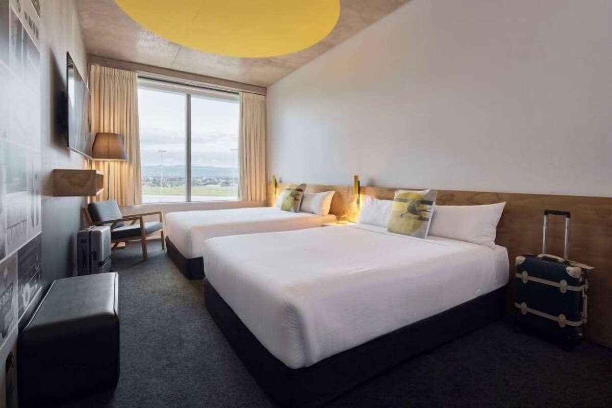 Premium bedding, desk, blackout drapes, soundproofing