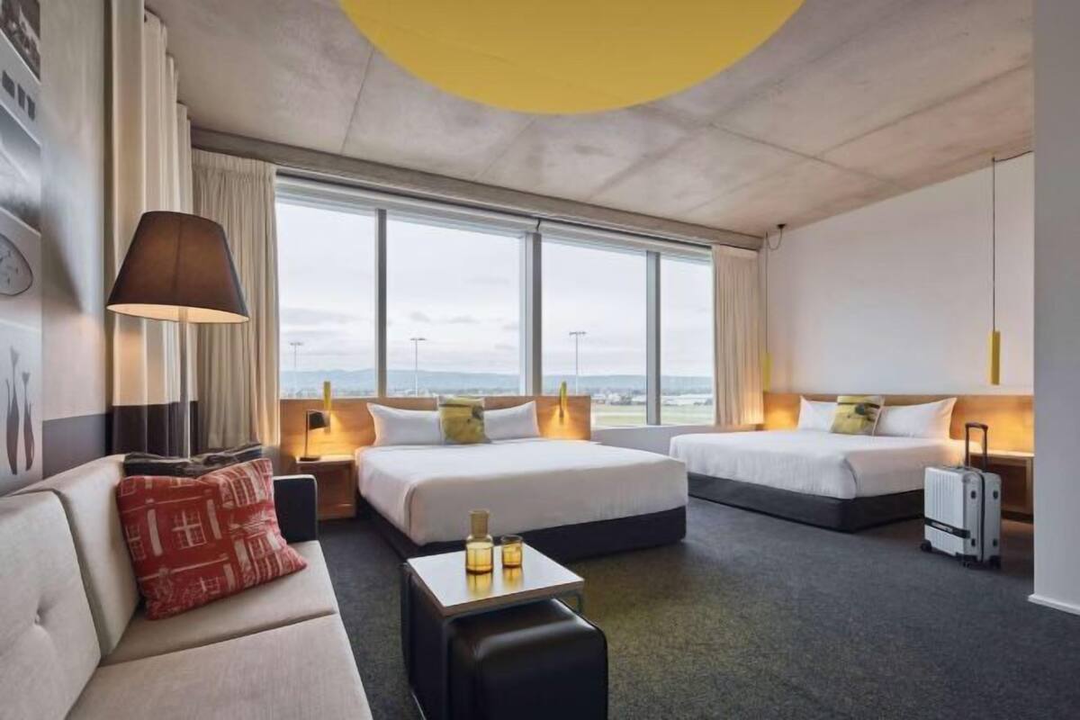 Premium bedding, desk, blackout drapes, soundproofing
