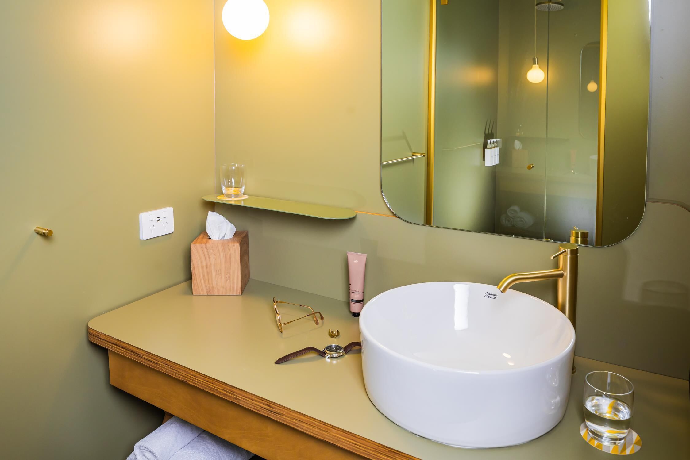 shower, designer toiletries, towels