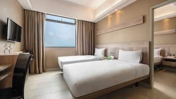 Family Room | Minibar, in-room safe, desk, laptop workspace
