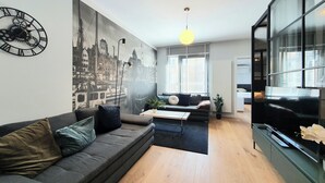 Leilighet – deluxe, 1 soverom, byutsikt | Oppholdsområde