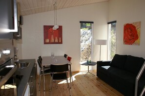 Comfort Bungalow | Living area | Flat-screen TV - Fjordlyst Camping and Cottages (Aabenraa)