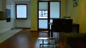 Exclusive Apartment, 1 Bedroom | Living area | Flat-screen TV - J&K Apartaments (Warsaw)