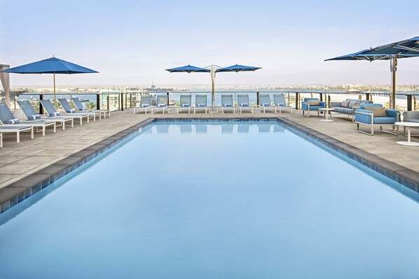 Outdoor pool, open 8:00 AM to 9:00 PM, free pool cabanas, pool umbrellas