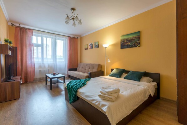 Premium bedding, blackout curtains, iron/ironing board, free WiFi