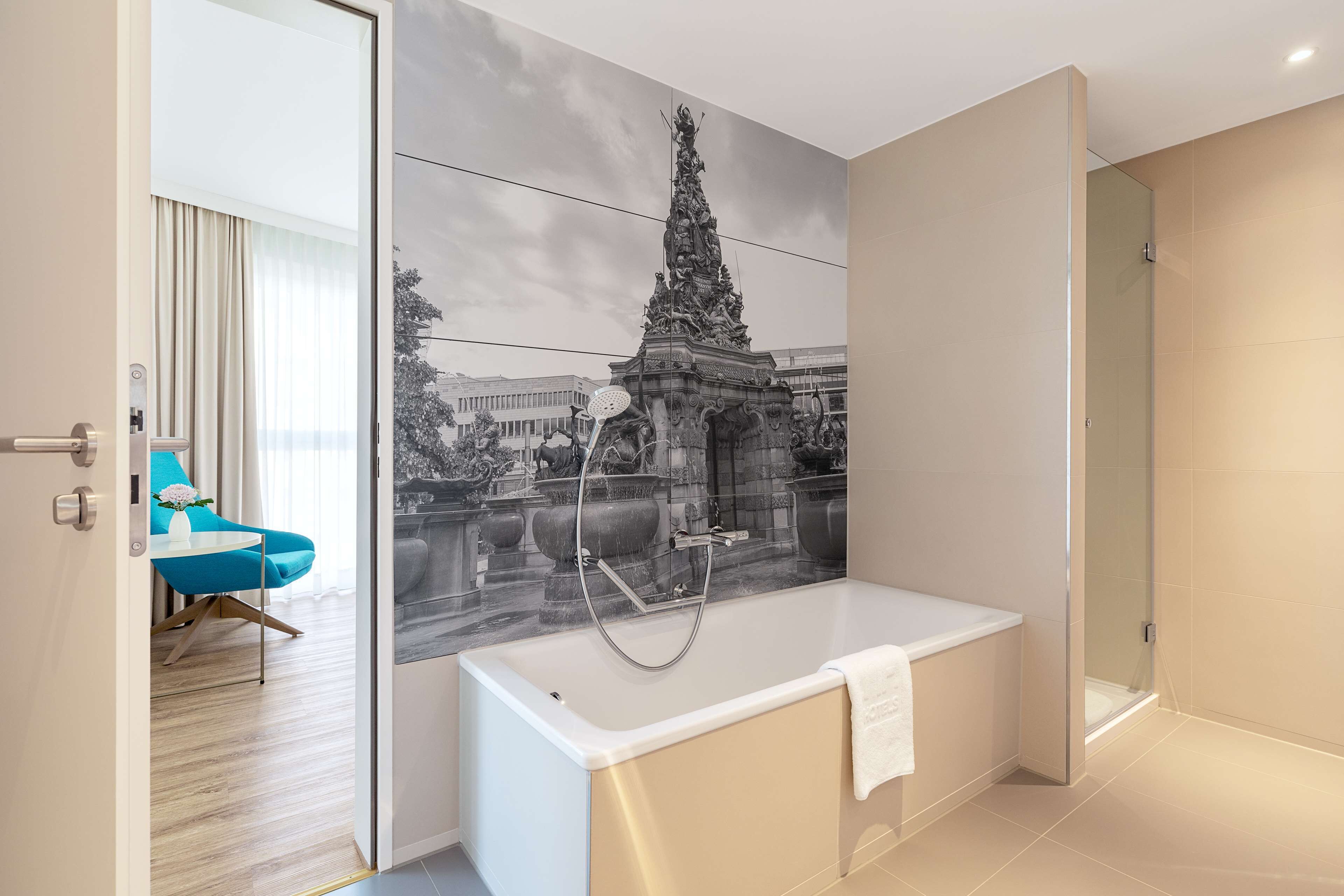 deep-soaking bathtub, rainfall showerhead, eco-friendly toiletries