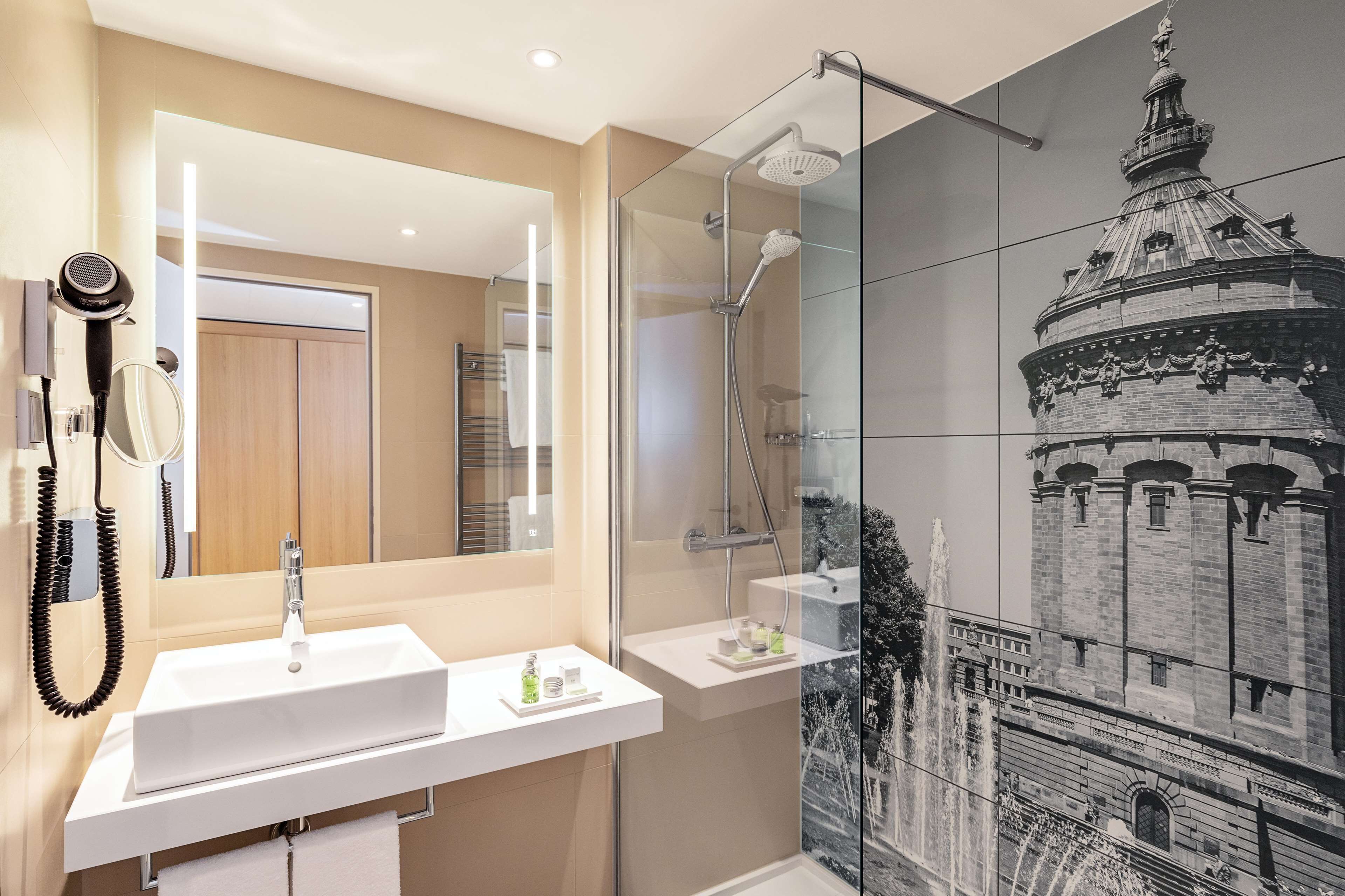 deep-soaking bathtub, rainfall showerhead, eco-friendly toiletries