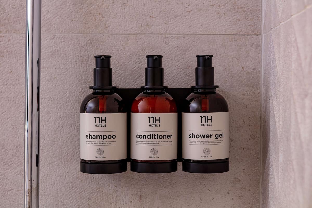 deep-soaking bathtub, rainfall showerhead, eco-friendly toiletries