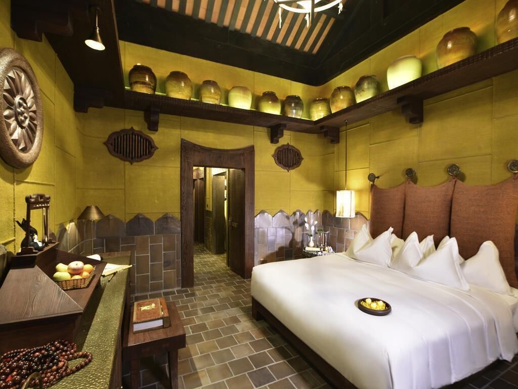 Deluxe-værelse - 1 kingsize-seng (Village View) | Premium-sengetøj, minibar, pengeskab på værelset, skrivebord