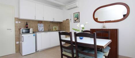 Fridge, microwave, toaster, cookware/dishes/utensils