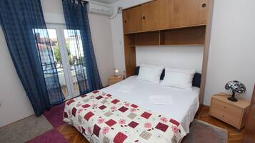 1 dormitorio, tabla de planchar con plancha, wifi gratis y ropa de cama