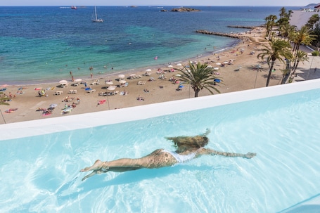 2 outdoor pools, open 9 AM to 9 PM, pool loungers. One Ibiza Suites