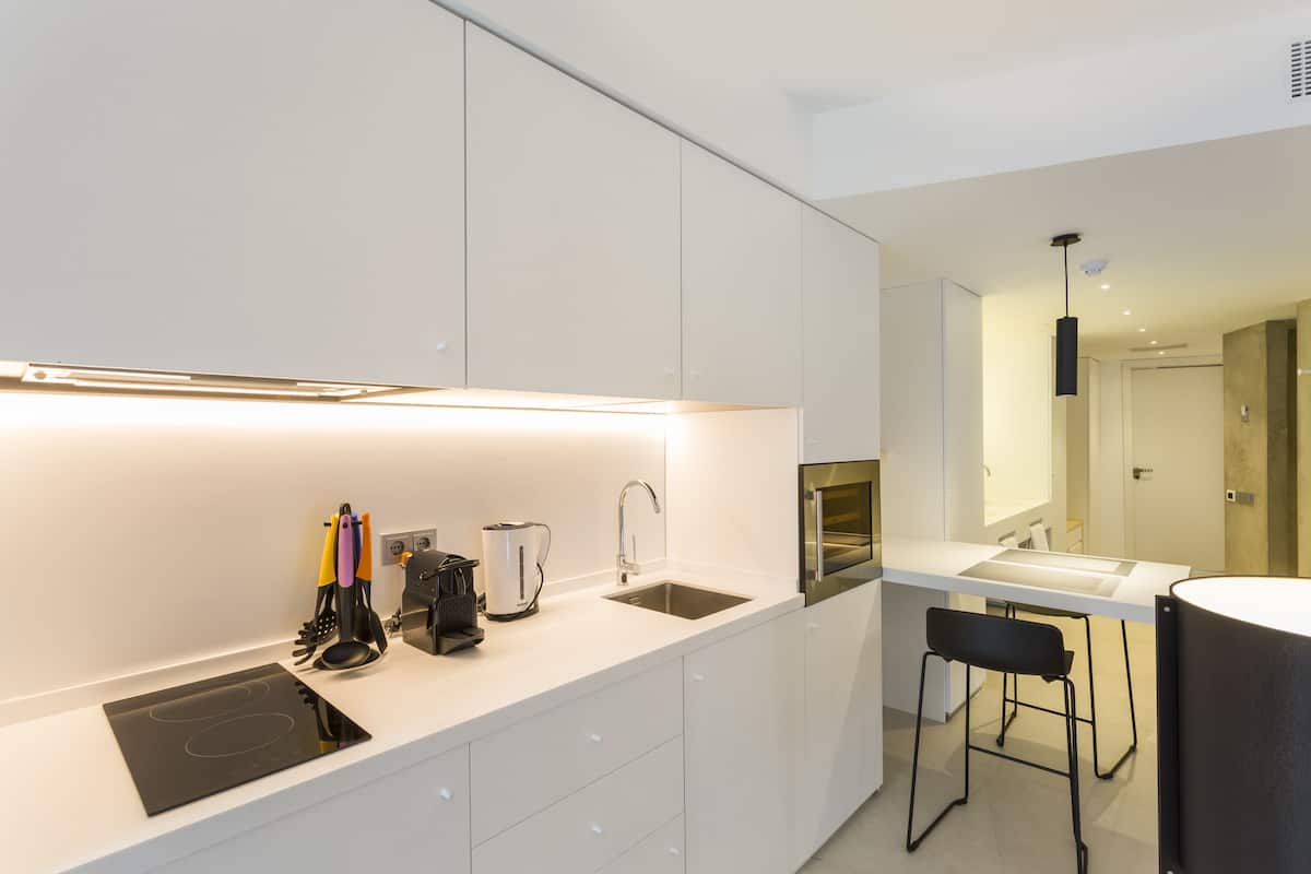 full-sized fridge, microwave, stovetop, espresso maker