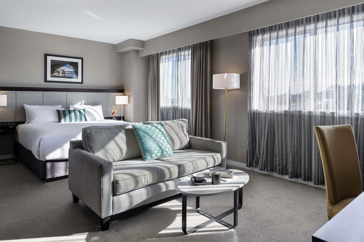 Deluxe Room, 1 King Bed | In-room safe, desk, laptop workspace, soundproofing