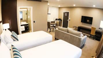 Habitación Deluxe, 2 camas individuales | Caja fuerte, escritorio, espacio para trabajar con un portátil