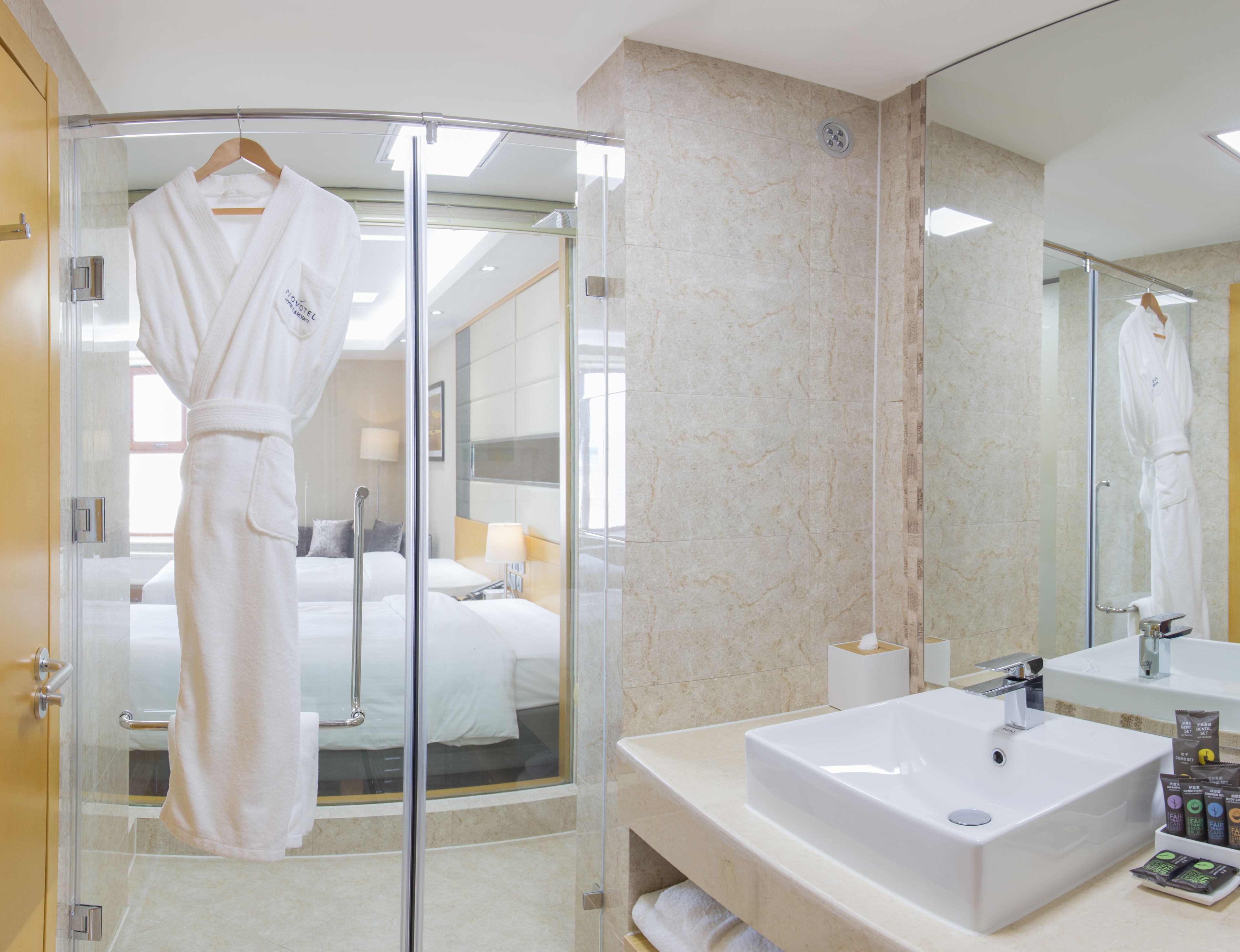 rainfall showerhead, eco-friendly toiletries, hair dryer, bathrobes