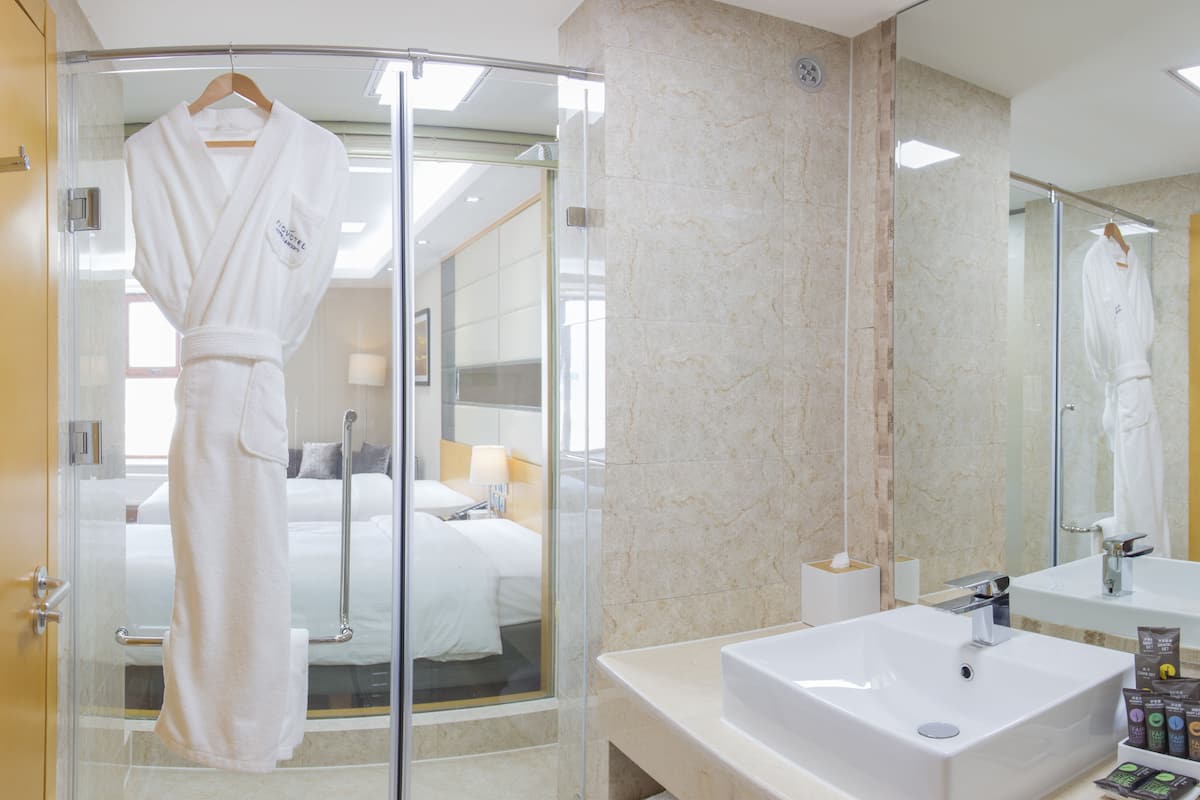 rainfall showerhead, eco-friendly toiletries, hair dryer, bathrobes