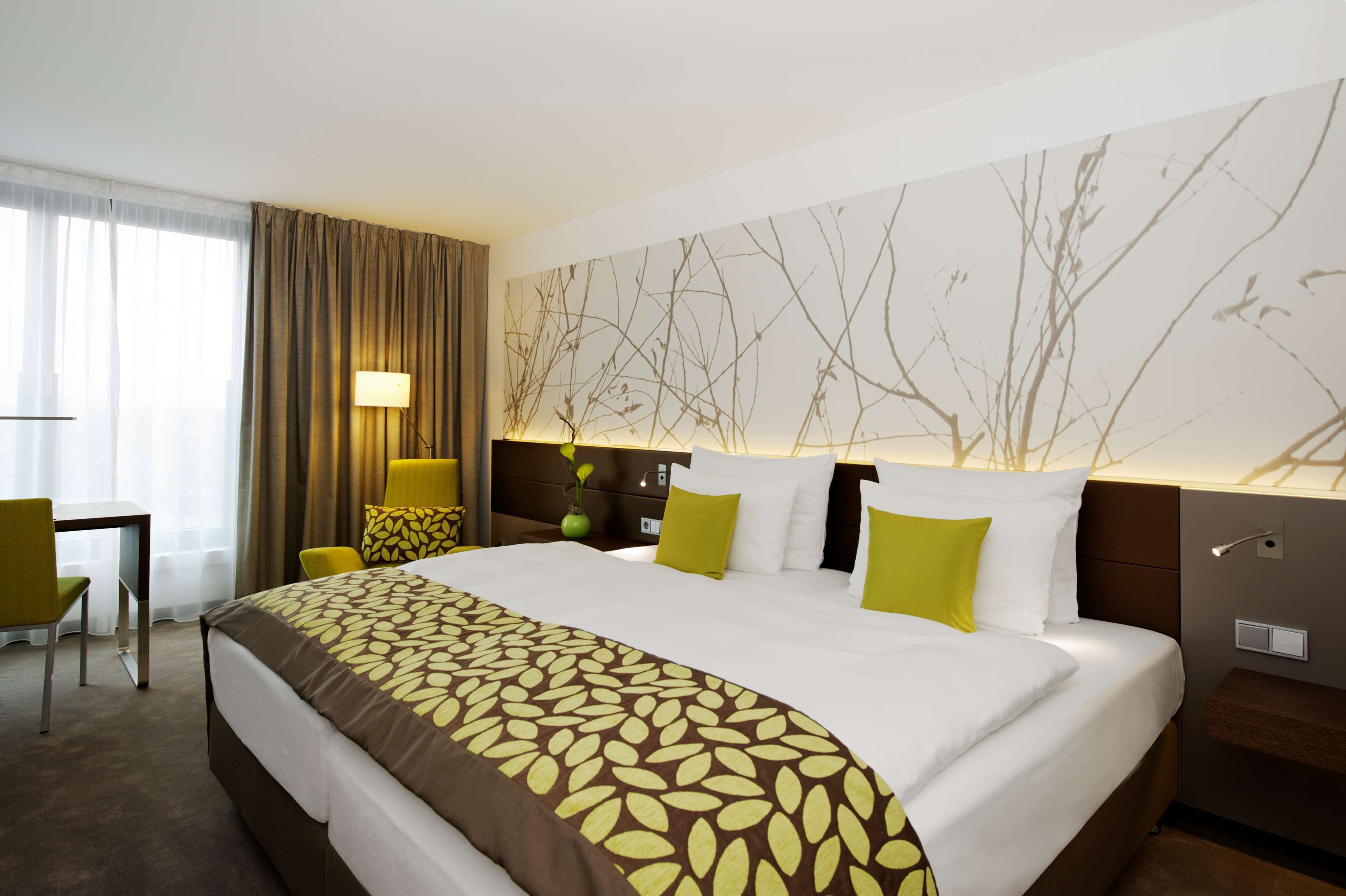 Deluxe Room, City View | Premium bedding, in-room safe, desk, blackout drapes