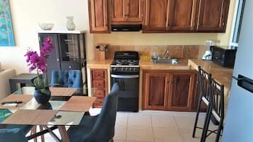 Standard Condo, 1 King Bed, Kitchen, Ocean View | Private kitchen | Full-sized fridge, microwave, oven, stovetop