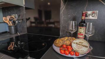 Cottage | Private kitchen | Stovetop, dishwasher, highchair, cookware/dishes/utensils