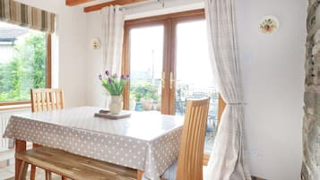 Cottage | Private kitchen | Microwave, stovetop, dishwasher, highchair