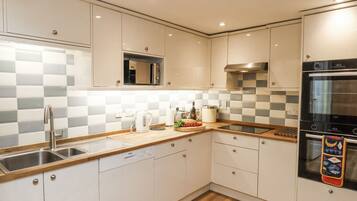 Dishwasher, high chair, cookware/dishes/utensils