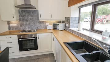 Cottage | Cuisine privée | Plaque de cuisson, lave-vaisselle, chaise haute