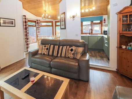 Cottage | Living area | TV. Langdale Lodge 15