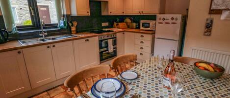 Cottage | Private kitchen | Fridge, stovetop, dishwasher, highchair