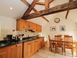 Cottage | Private kitchen | Stovetop, dishwasher, highchair, cookware/dishes/utensils